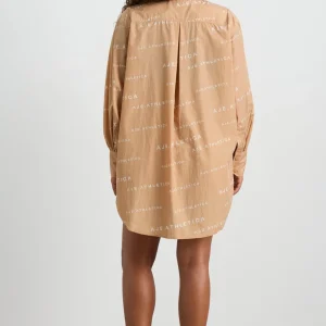 Shop Aje ATHLETICA All Over Logo Spray Shirt 406 Natural Tan / White