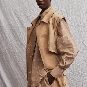 Shop Aje ATHLETICA All Over Logo Spray Shirt 406 Natural Tan / White