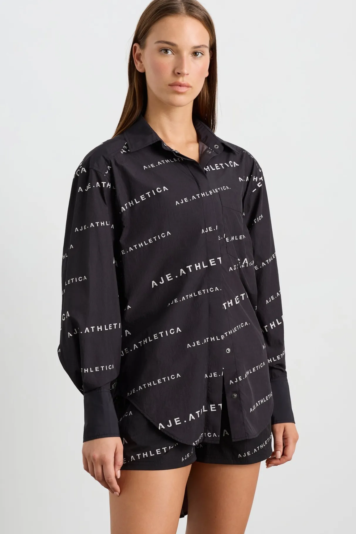 all_over_logo_spray_shirt__3.webp Discount Aje ATHLETICA All Over Logo Spray Shirt 406 Black/White