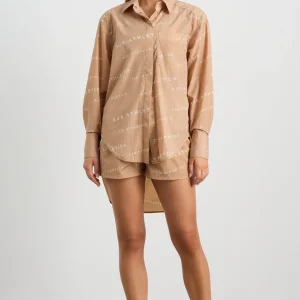 Shop Aje ATHLETICA All Over Logo Spray Shirt 406 Natural Tan / White