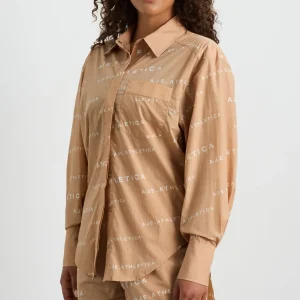 Shop Aje ATHLETICA All Over Logo Spray Shirt 406 Natural Tan / White