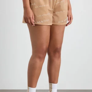 Cheap Aje ATHLETICA All Over Logo Spray Short 616 Natural Tan / White