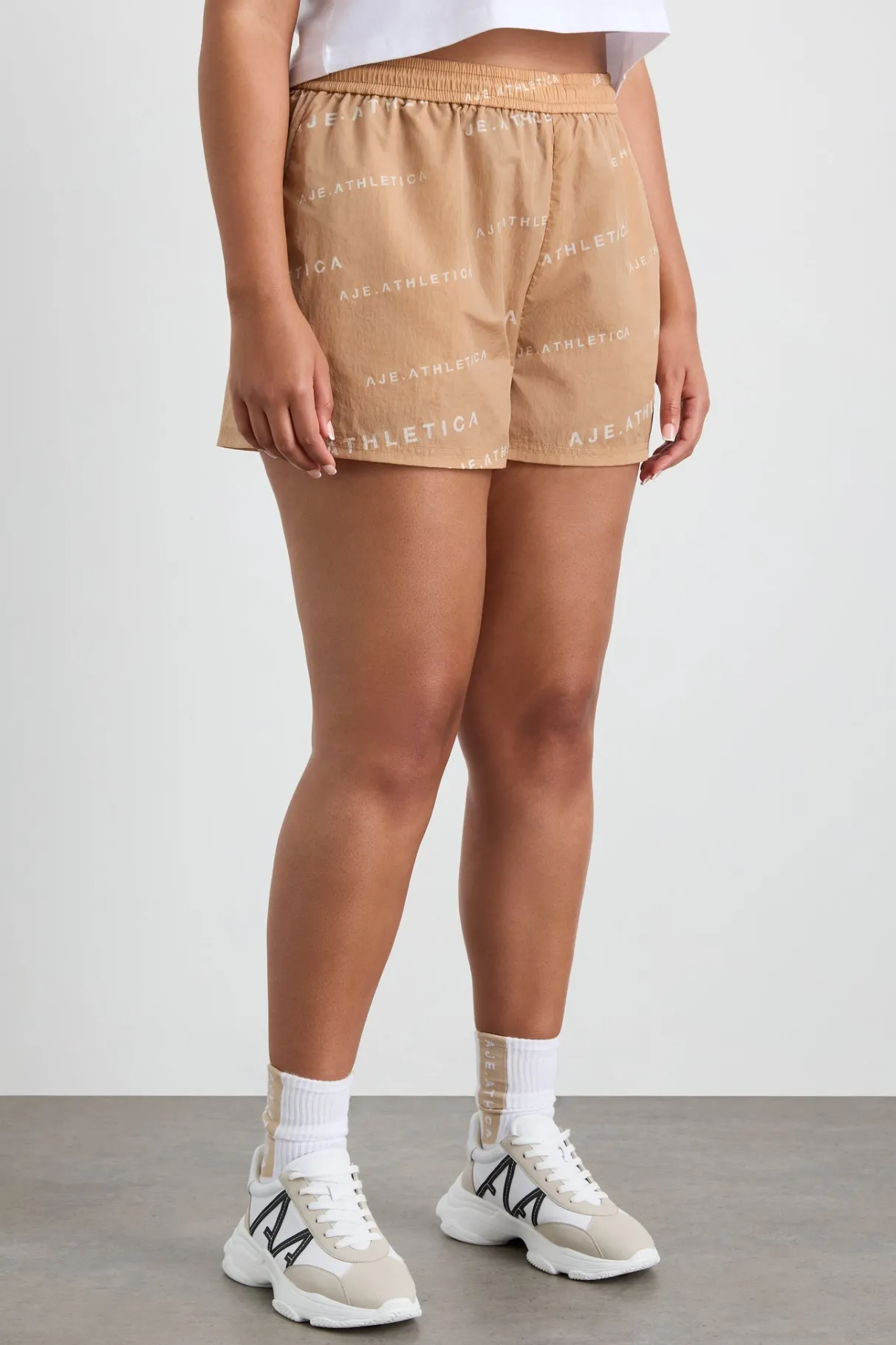all_over_logo_spray_short__10.webp Cheap Aje ATHLETICA All Over Logo Spray Short 616 Natural Tan / White