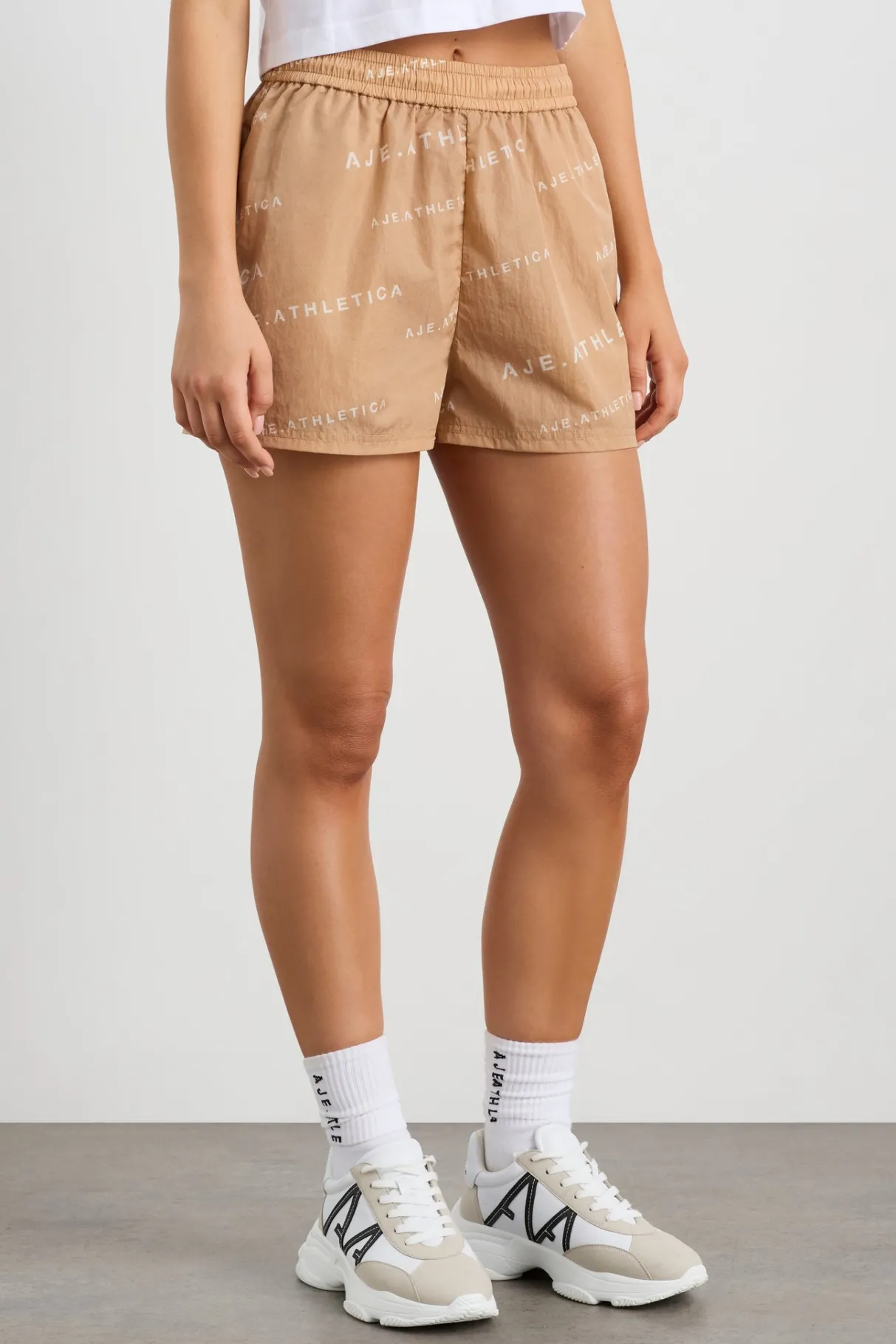 all_over_logo_spray_short__2.webp Cheap Aje ATHLETICA All Over Logo Spray Short 616 Natural Tan / White