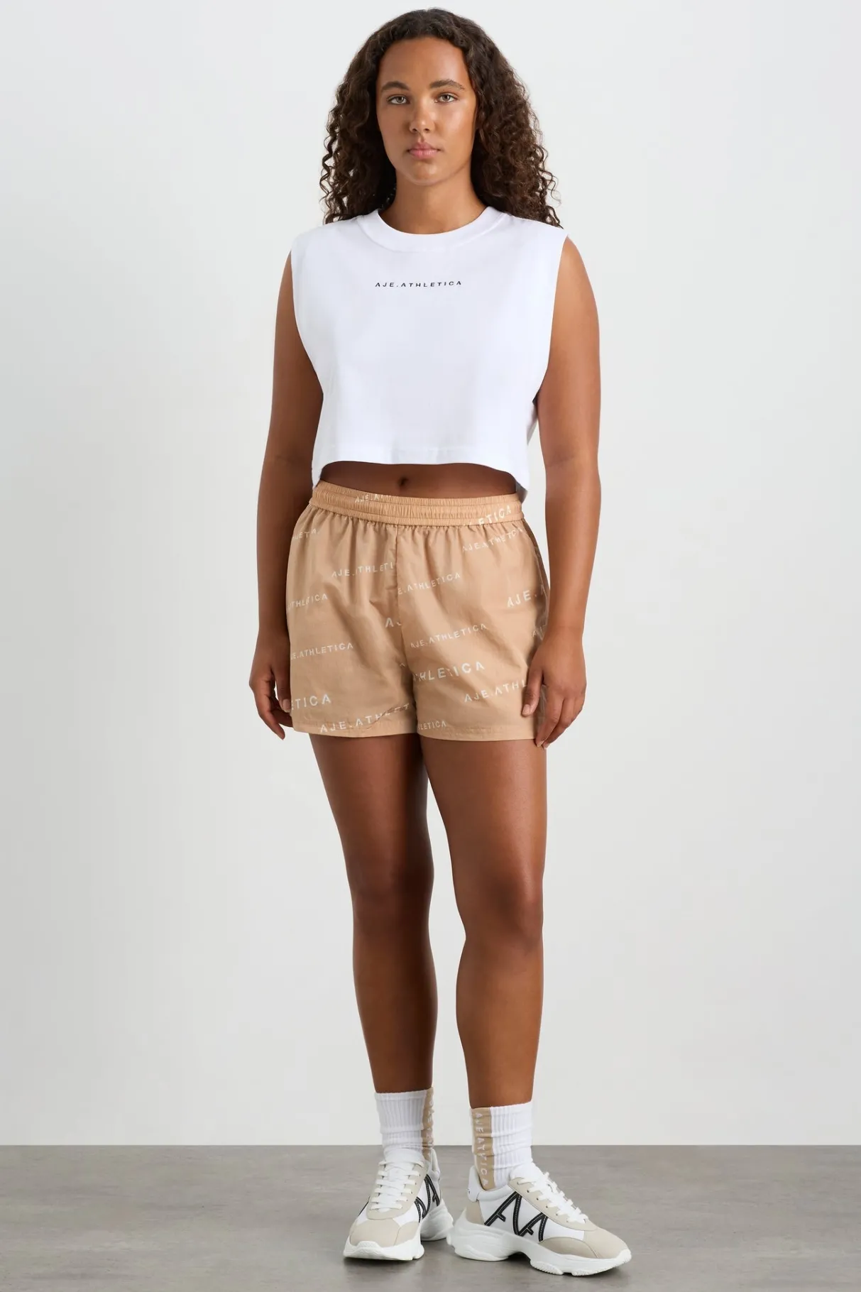 all_over_logo_spray_short__5.webp Cheap Aje ATHLETICA All Over Logo Spray Short 616 Natural Tan / White