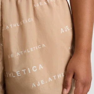 Cheap Aje ATHLETICA All Over Logo Spray Short 616 Natural Tan / White