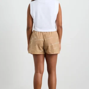 Cheap Aje ATHLETICA All Over Logo Spray Short 616 Natural Tan / White