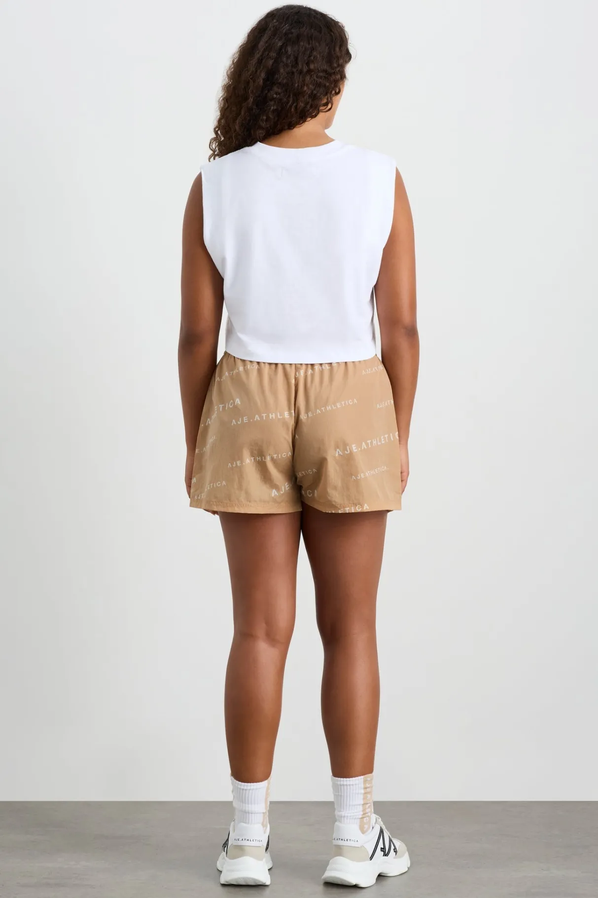 all_over_logo_spray_short__8.webp Cheap Aje ATHLETICA All Over Logo Spray Short 616 Natural Tan / White