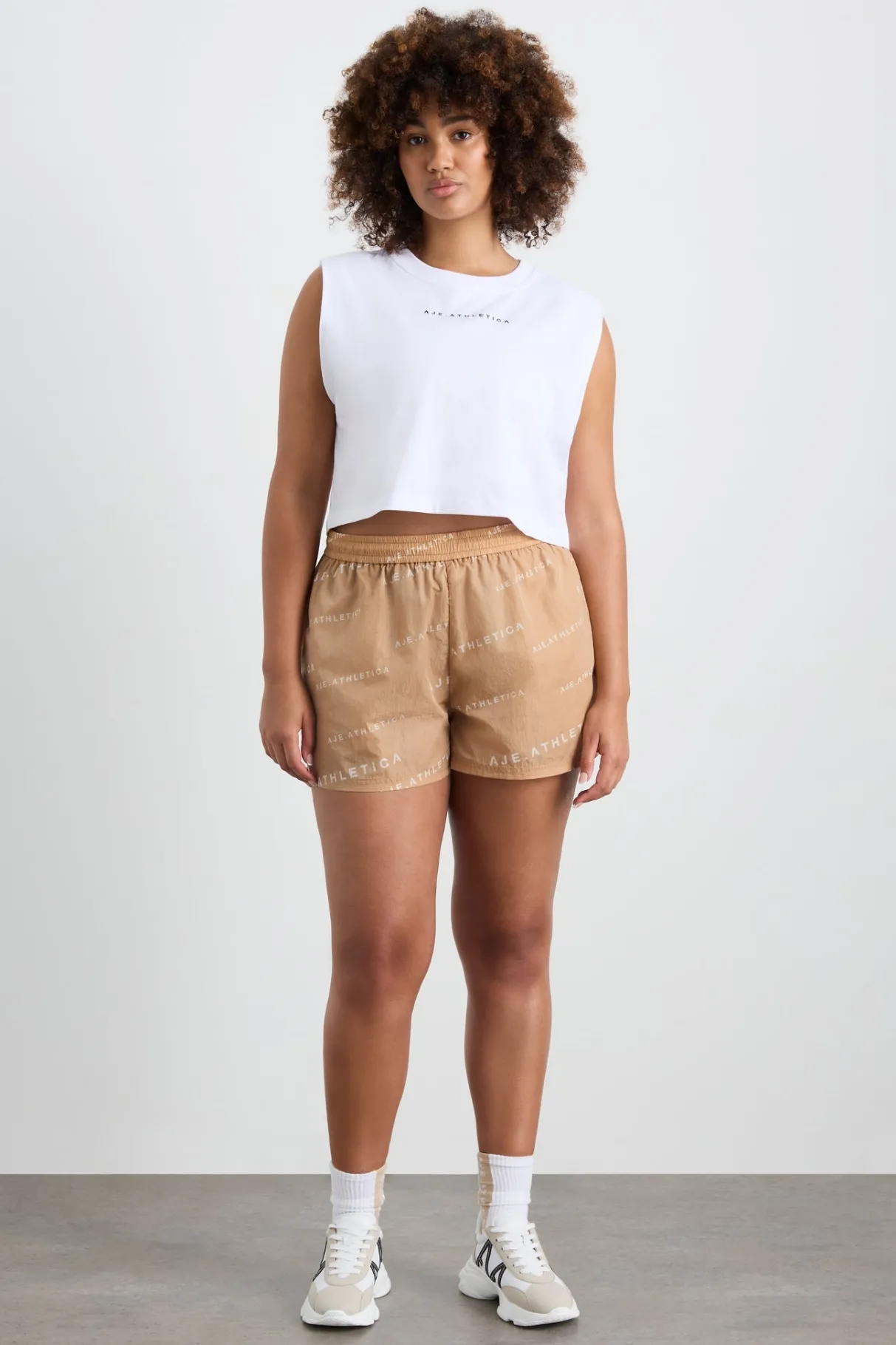 all_over_logo_spray_short__9.webp Cheap Aje ATHLETICA All Over Logo Spray Short 616 Natural Tan / White