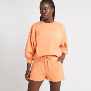 Store Aje ATHLETICA All Rounder Sweat Shorts 616 Orange Marle