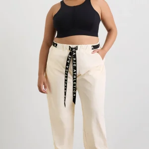Shop Aje ATHLETICA Belted Windbreak Pant 502 Limestone Beige Black