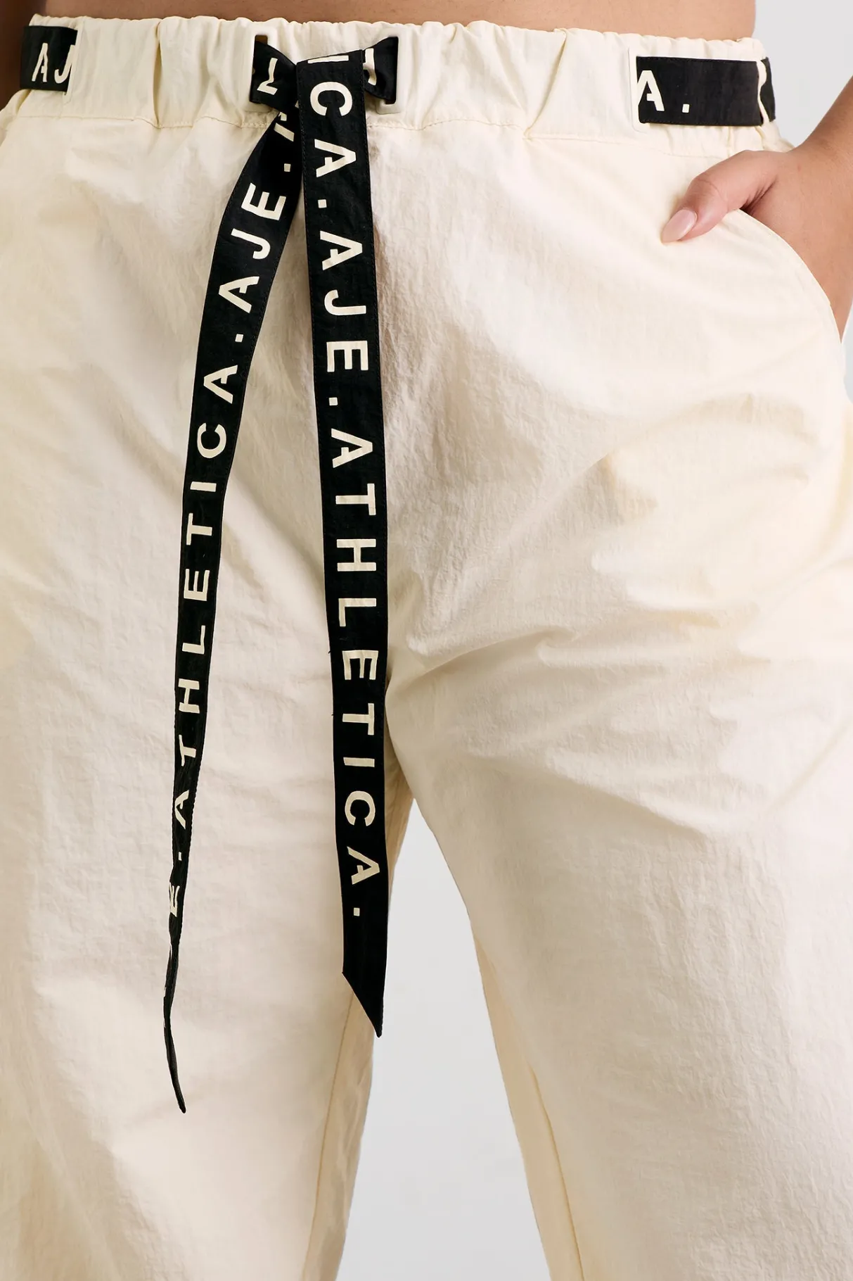 belted_windbreak_pant__13-2.webp Shop Aje ATHLETICA Belted Windbreak Pant 502 Limestone Beige Black