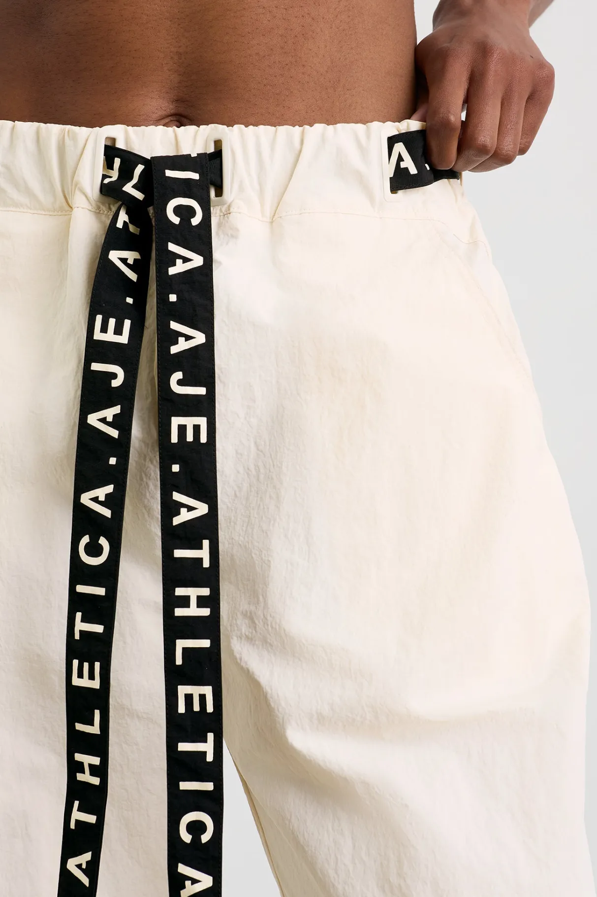 belted_windbreak_pant__3-2.webp Shop Aje ATHLETICA Belted Windbreak Pant 502 Limestone Beige Black