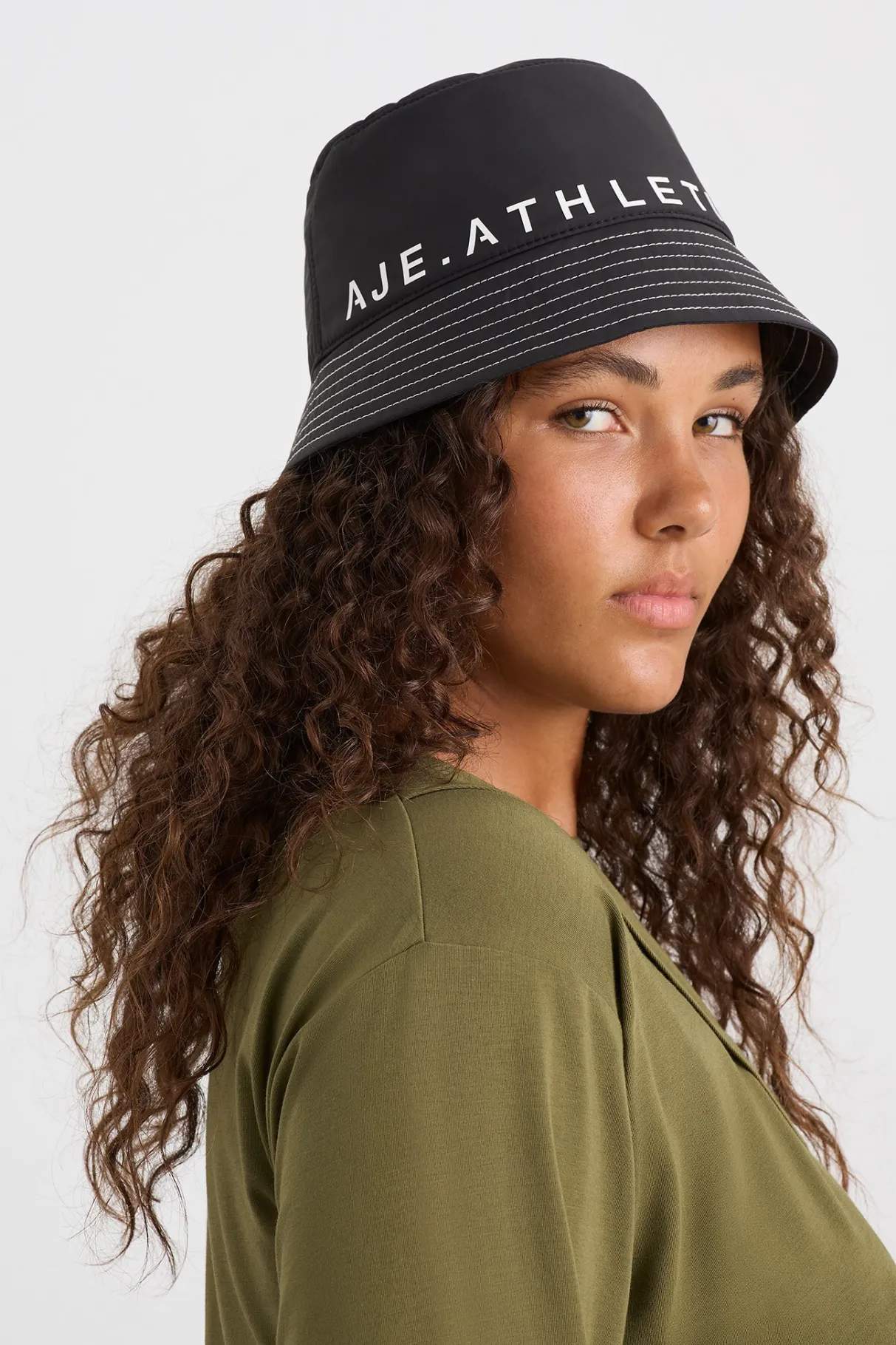 bold_spray_bucket_hat__2.webp Flash Sale Aje ATHLETICA Bold Spray Bucket Hat 979 Black/White