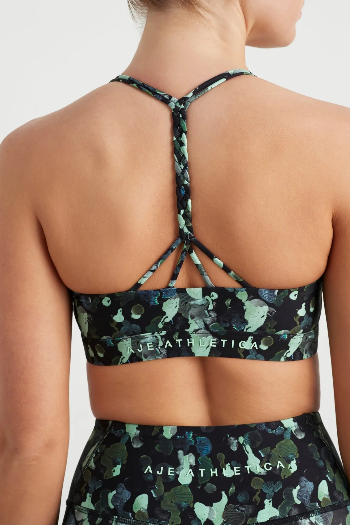 braided_strappy_sports_bra__4-1.webp Cheap Aje ATHLETICA Braided Strappy Sports Bra 334 Green Painted Freeform