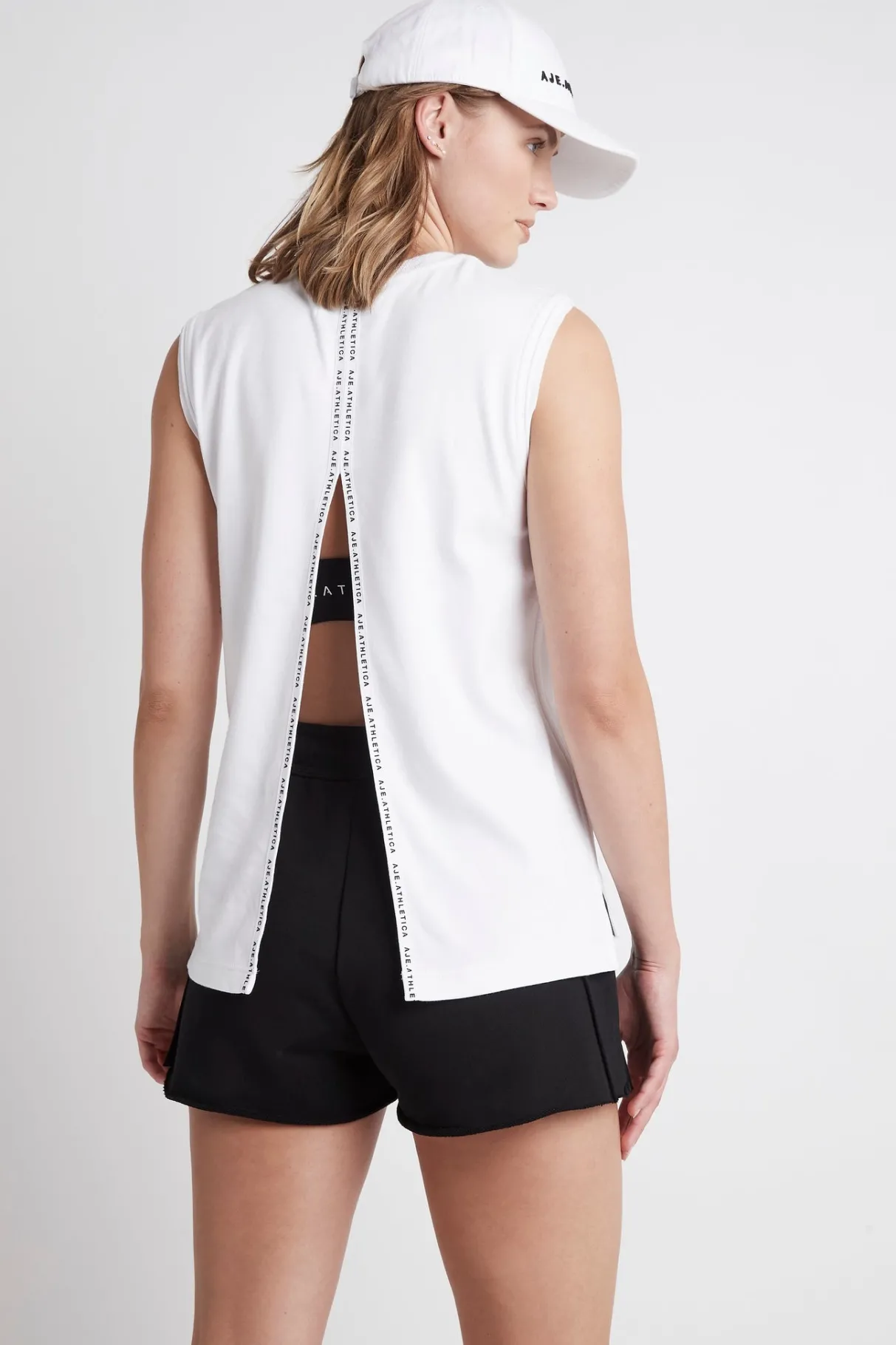 classic_logo_split_back_tank__4.webp Fashion Aje ATHLETICA Classic Logo Split Back Tank 111 White/Black