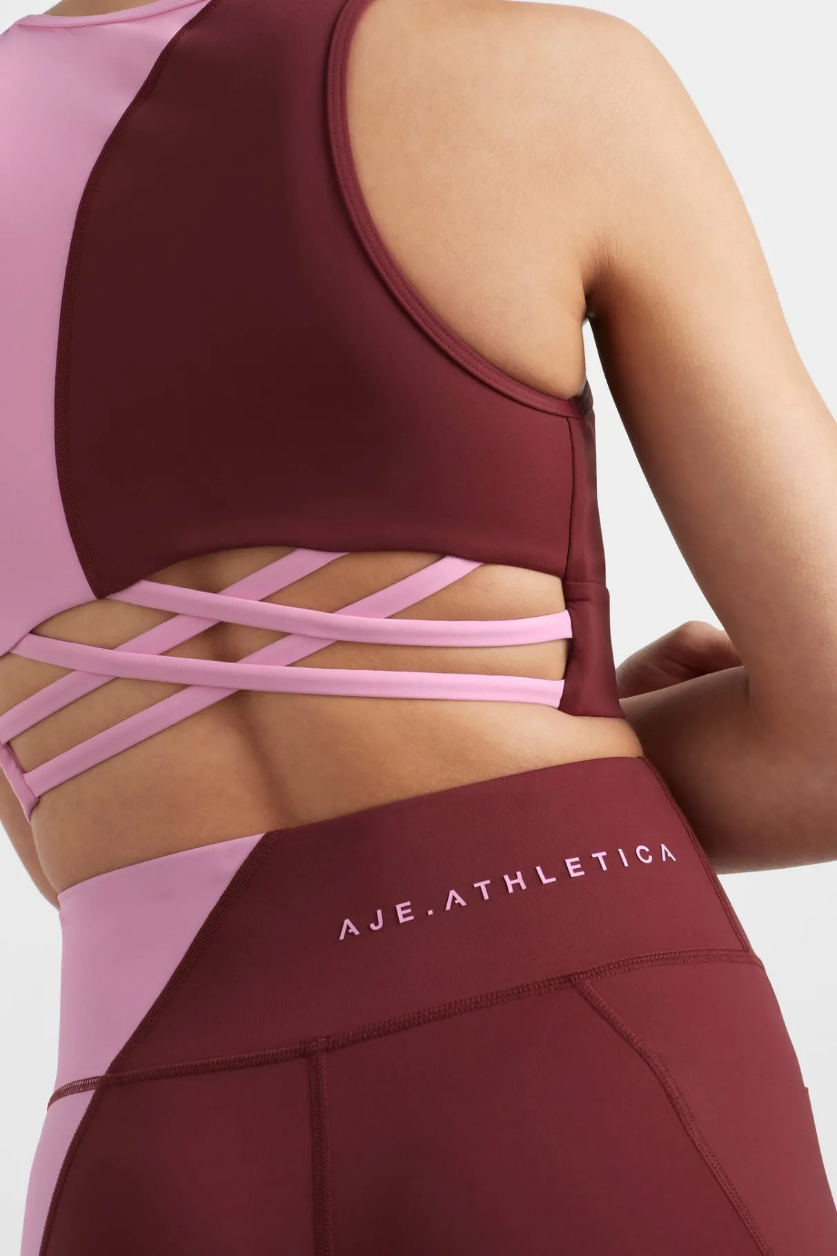 colour_block_crop_top__0-1.webp Store Aje ATHLETICA Colour Block Crop Top 336 Burnt Burgundy/Bonbon Pink