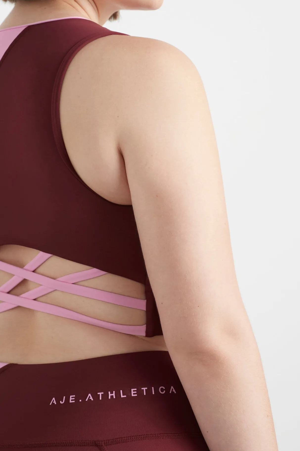 colour_block_crop_top__15-1.webp Store Aje ATHLETICA Colour Block Crop Top 336 Burnt Burgundy/Bonbon Pink