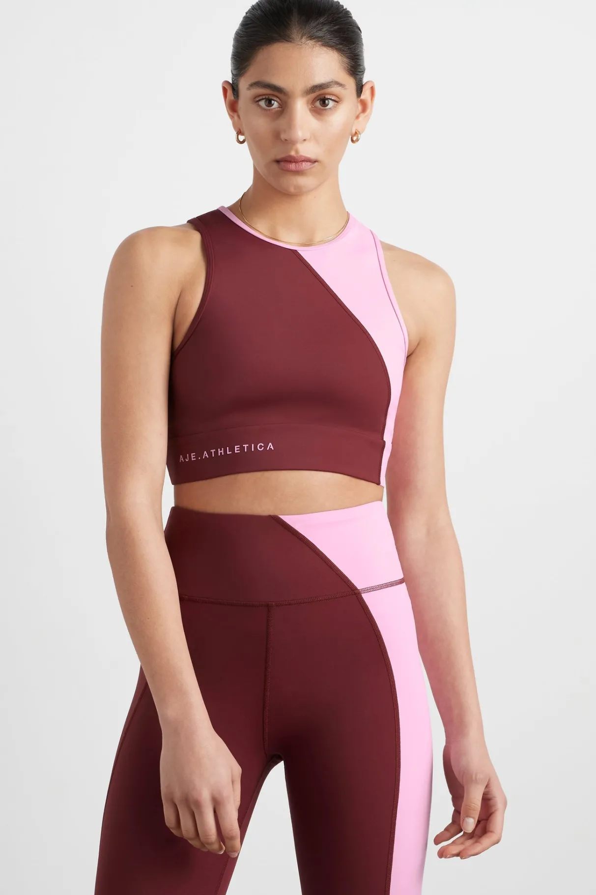 colour_block_crop_top__2-1.webp Store Aje ATHLETICA Colour Block Crop Top 336 Burnt Burgundy/Bonbon Pink