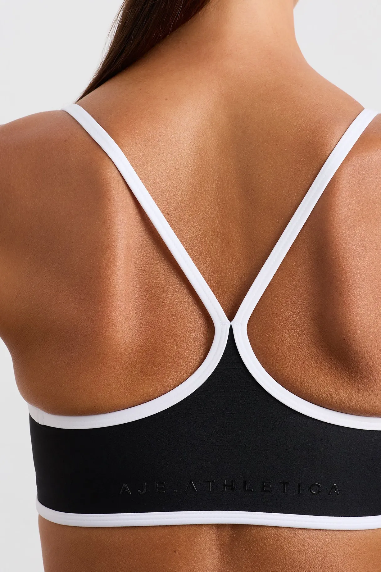 contrast_bind_sports_bra__3.webp Store Aje ATHLETICA Contrast Bind Sports Bra 307 Black/White