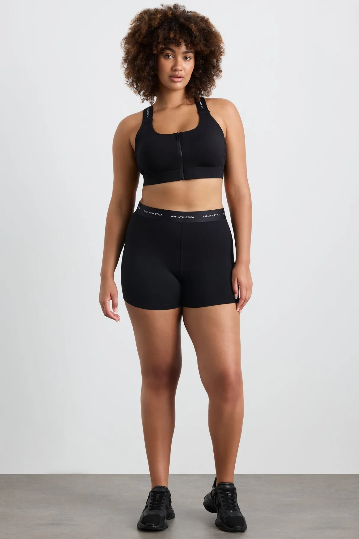 contrast_zip_sports_bra__10.webp Discount Aje ATHLETICA Contrast Zip Sports Bra 304 Black/White