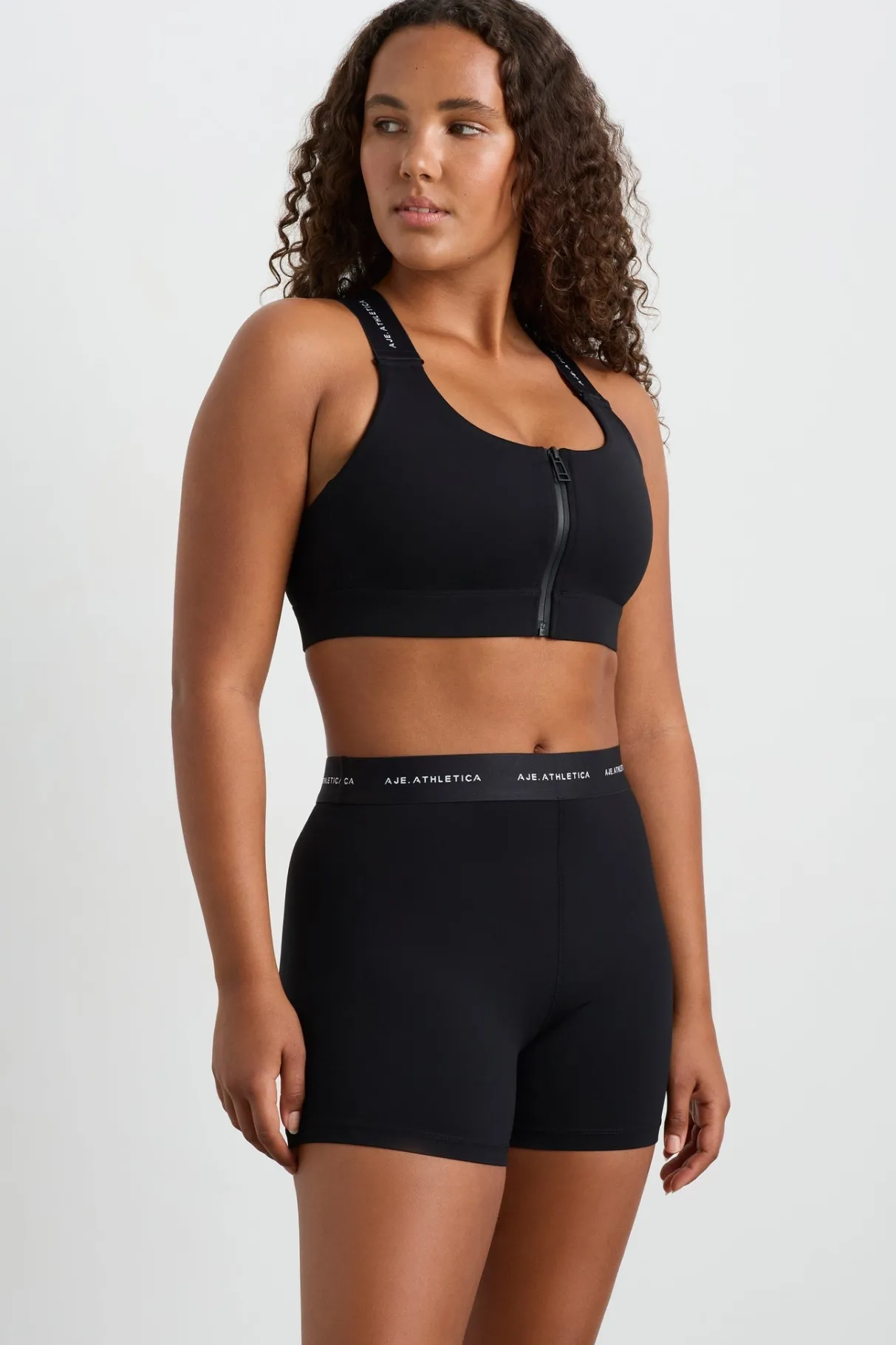 contrast_zip_sports_bra__5.webp Discount Aje ATHLETICA Contrast Zip Sports Bra 304 Black/White