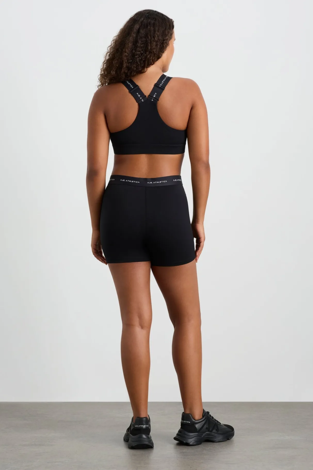 contrast_zip_sports_bra__8.webp Discount Aje ATHLETICA Contrast Zip Sports Bra 304 Black/White