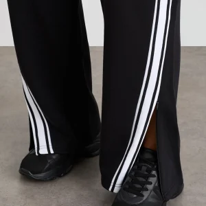 Store Aje ATHLETICA Contrast Zip Trackpants 504 Black