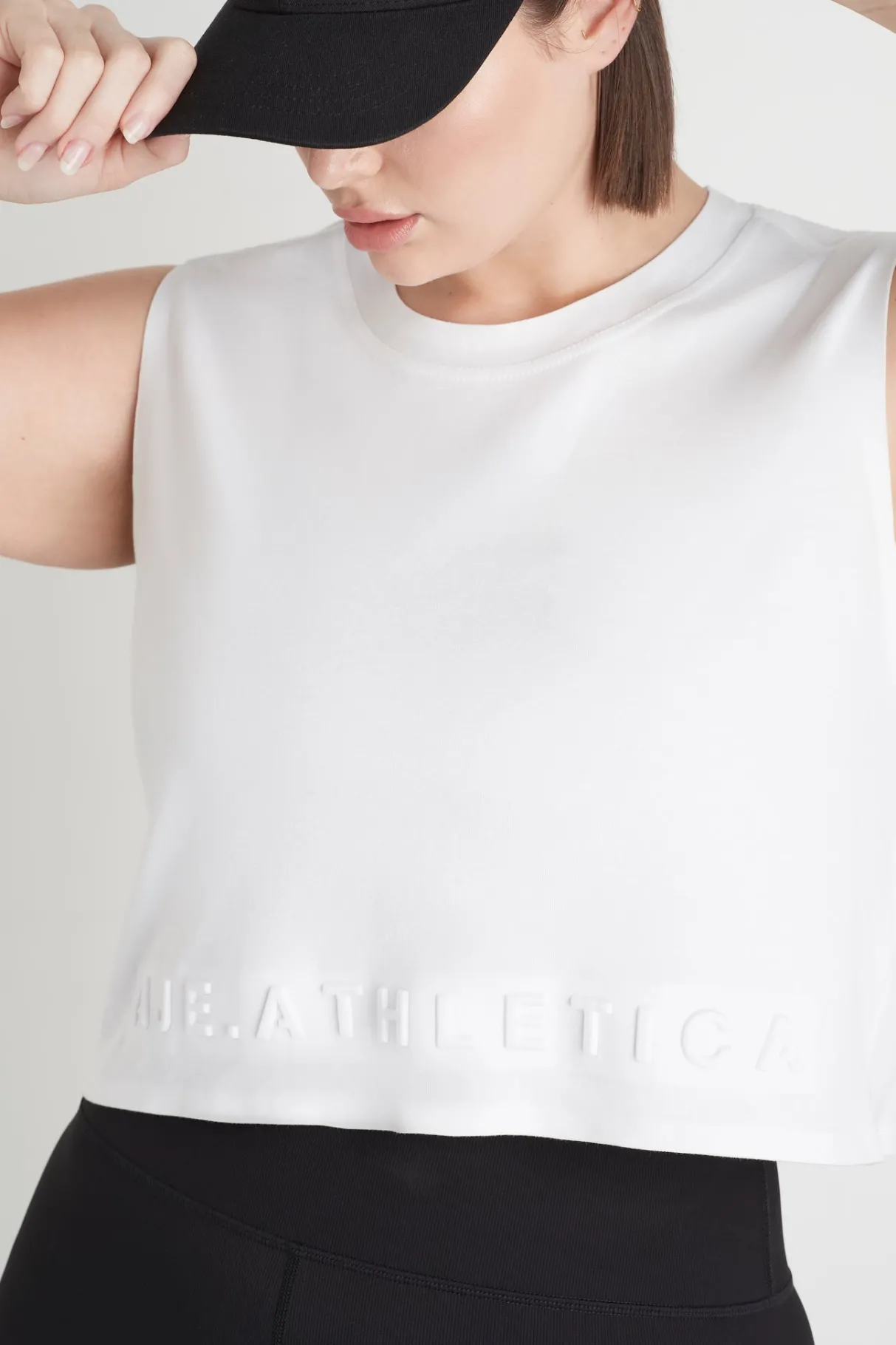 cropped_embossed_signature_logo_tank__12-3.webp Shop Aje ATHLETICA Cropped Embossed Signature Logo Tank 106 White