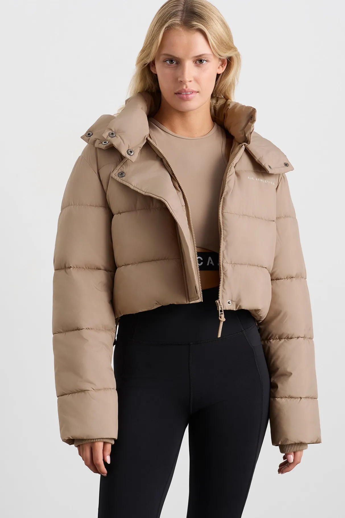 cropped_hooded_puffer_jacket__0-1.webp Fashion Aje ATHLETICA Cropped Hooded Puffer Jacket 764 Dune