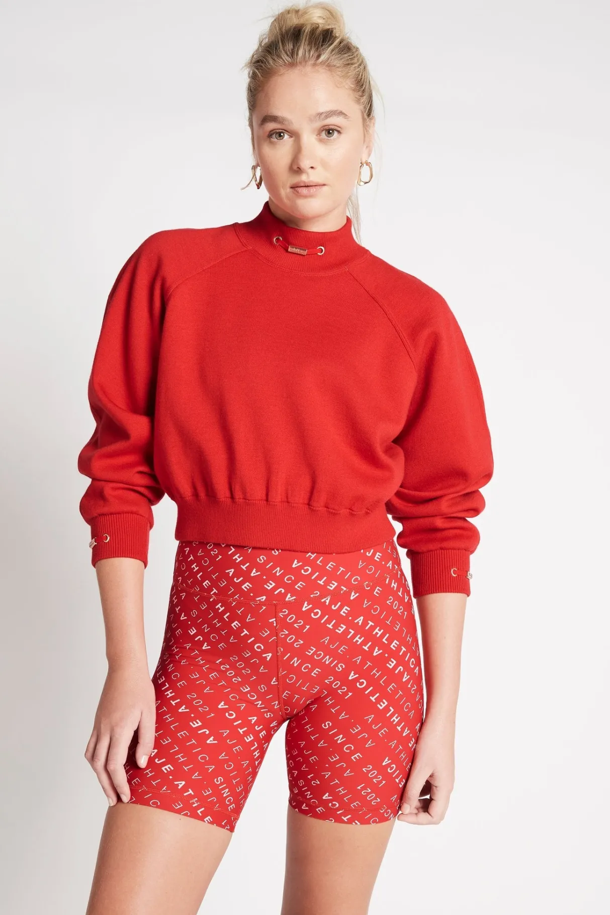 cropped_knit_funnel_neck_jumper__0.webp New Aje ATHLETICA Cropped Knit Funnel Neck Jumper 408 Garnet Red