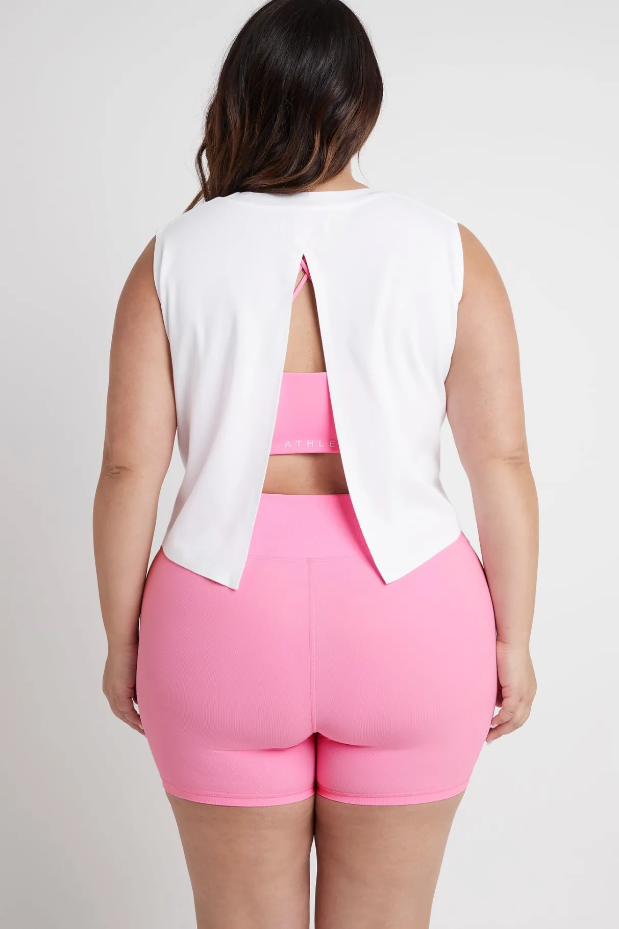 cropped_split_back_tank__15.webp New Aje ATHLETICA Cropped Split Back Tank 112 White/Dahlia Pink