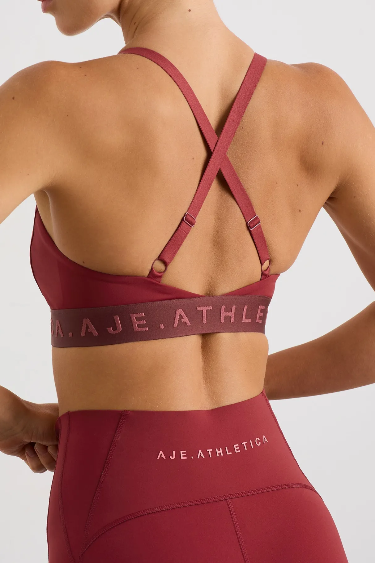 cross_back_bra__4.webp Clearance Aje ATHLETICA Cross Back Bra 359 Plum Red