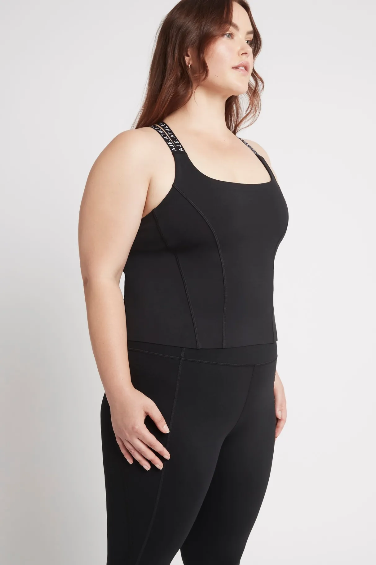 cross_back_logotape_tank__11.webp Hot Aje ATHLETICA Cross Back Logotape Tank 123 Black/White