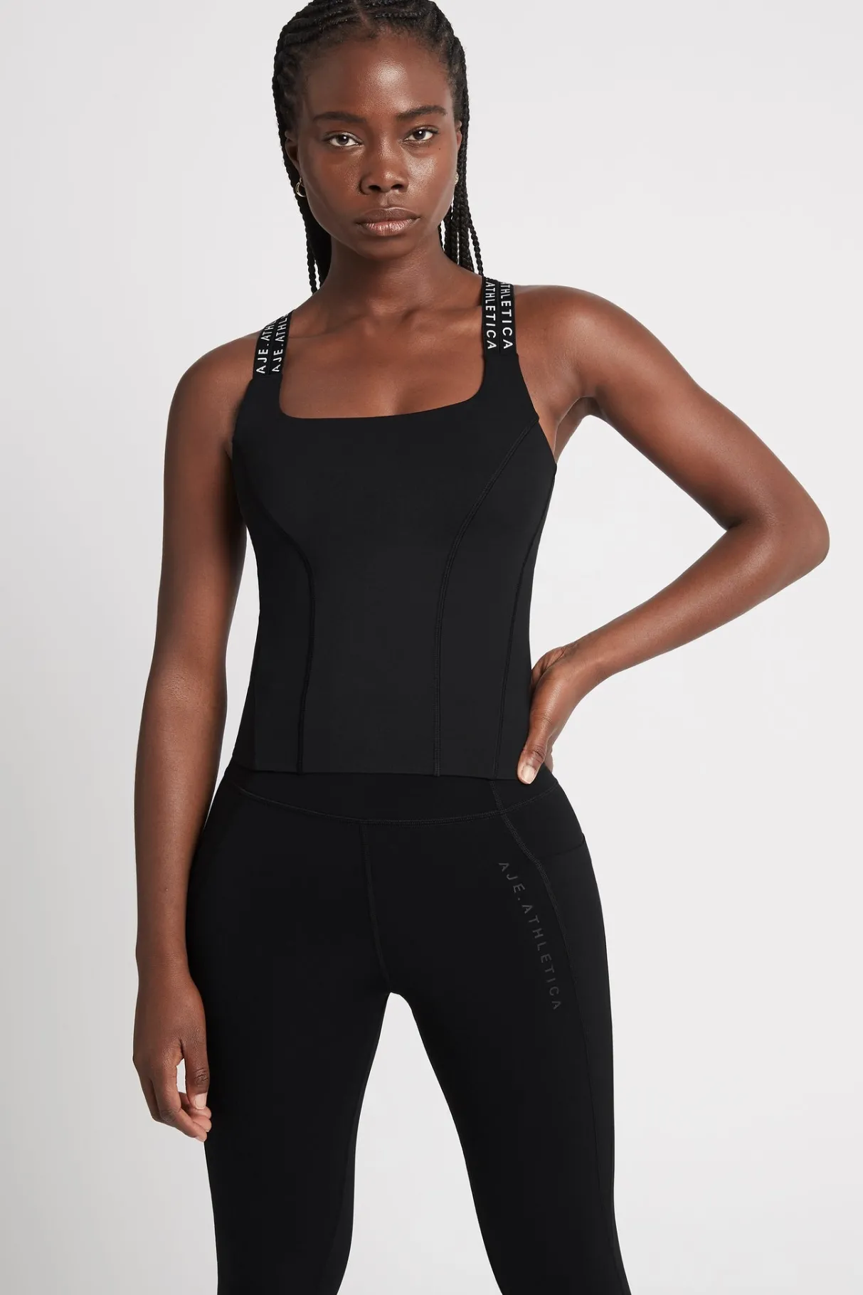 cross_back_logotape_tank__2.webp Hot Aje ATHLETICA Cross Back Logotape Tank 123 Black/White