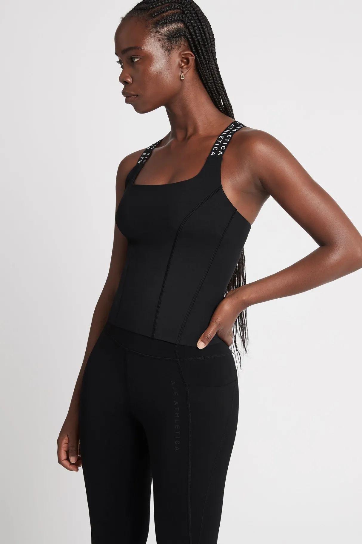 cross_back_logotape_tank__3.webp Hot Aje ATHLETICA Cross Back Logotape Tank 123 Black/White