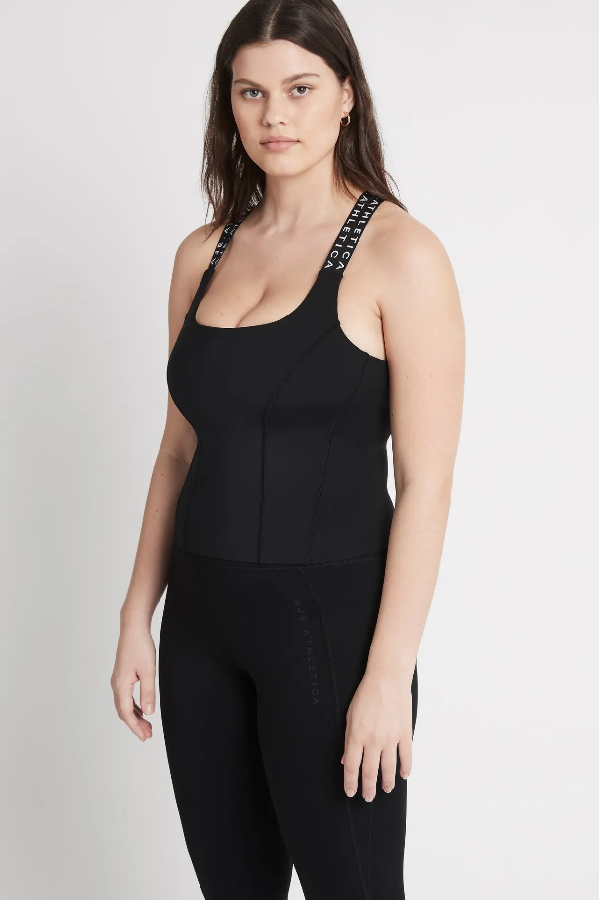 cross_back_logotape_tank__7.webp Hot Aje ATHLETICA Cross Back Logotape Tank 123 Black/White