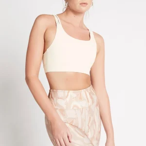 Online Aje ATHLETICA Cross Back Sports Bra 323 Light Ivory/Gold