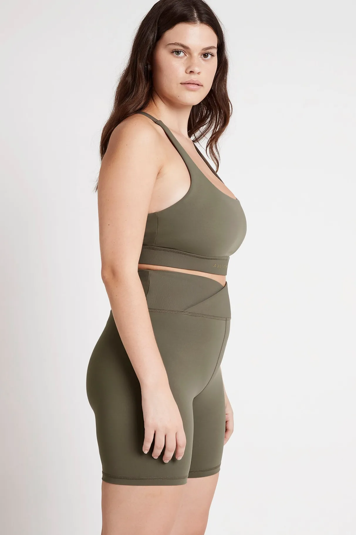 crossover_mid_length_bike_short__7.webp Flash Sale Aje ATHLETICA Crossover Mid Length Bike Short 614 Forest Green
