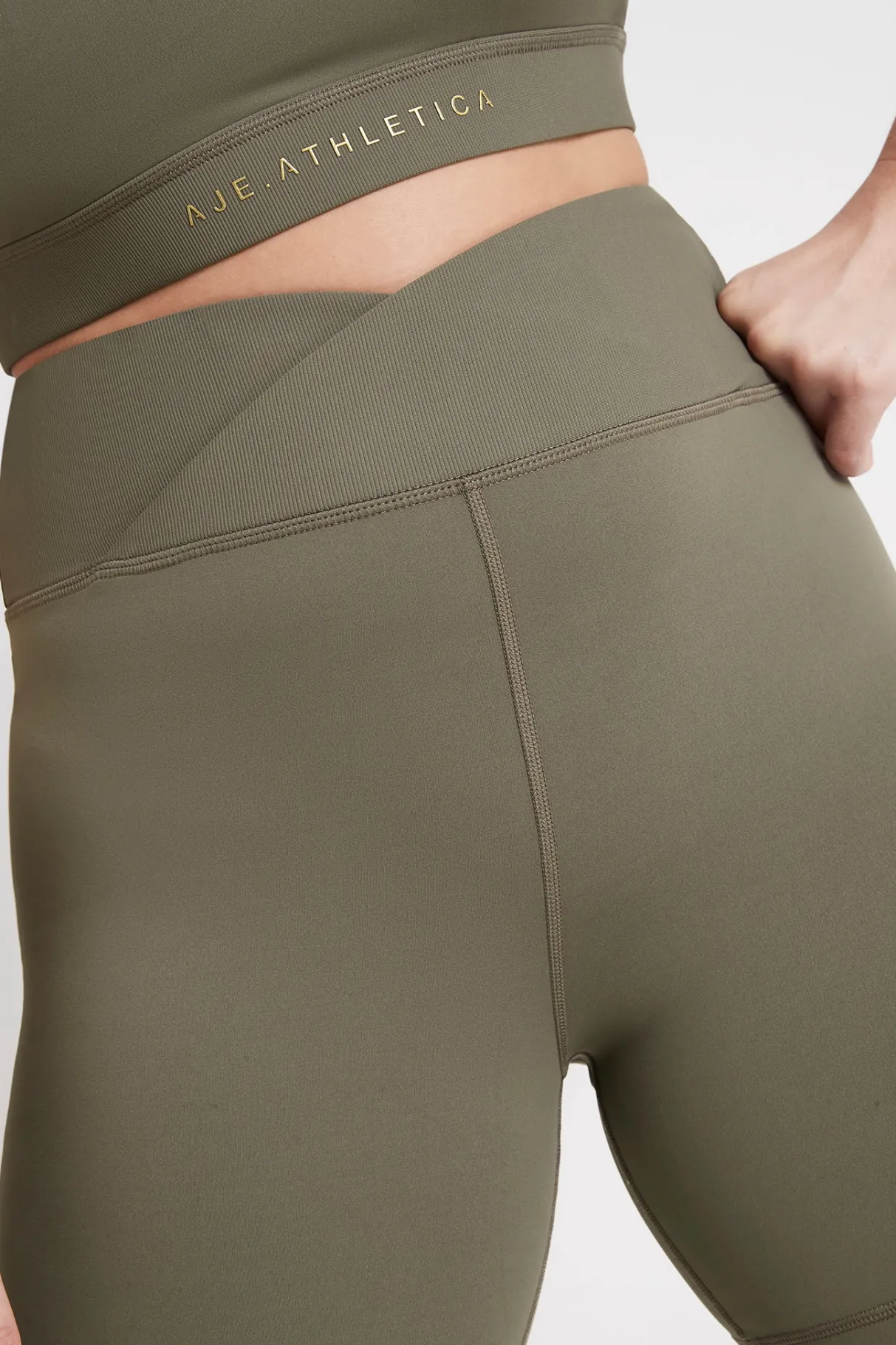 crossover_mid_length_bike_short__8.webp Flash Sale Aje ATHLETICA Crossover Mid Length Bike Short 614 Forest Green