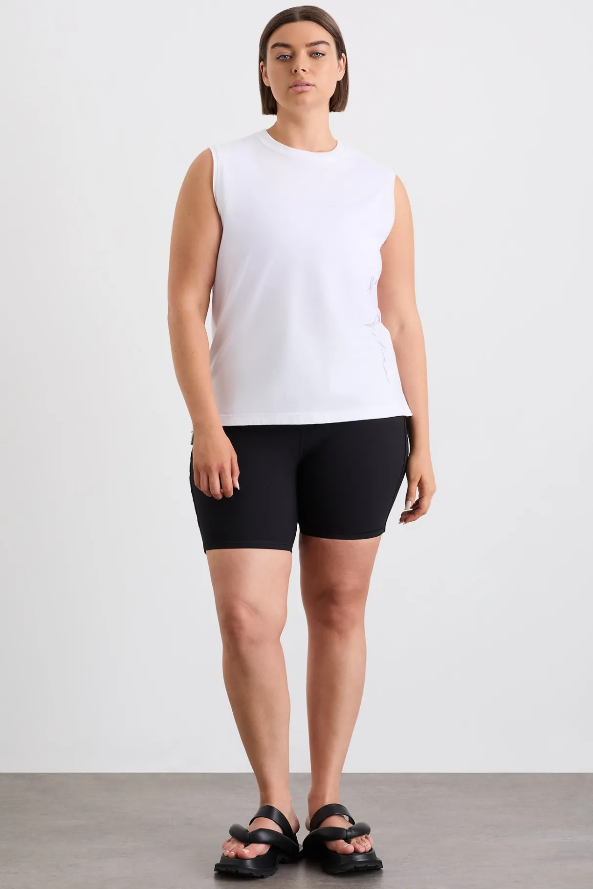 cursive_logo_longline_tank__7.webp Online Aje ATHLETICA Cursive Logo Longline Tank 101 White Ultra Violet