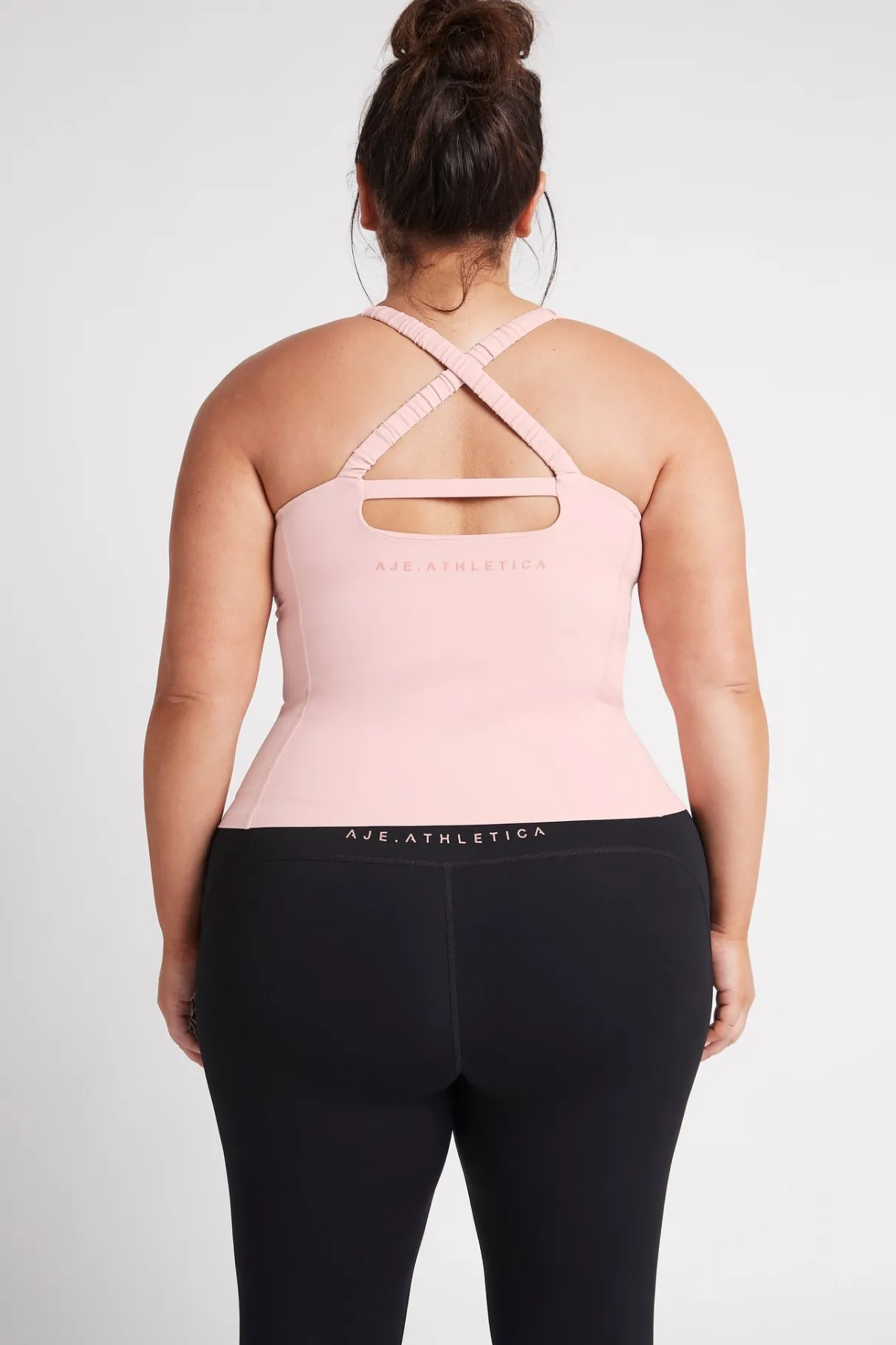 cut_out_cross_back_tank_top__16.webp Store Aje ATHLETICA Cut Out Cross Back Tank Top 125 Rose Quartz/Rose Pink