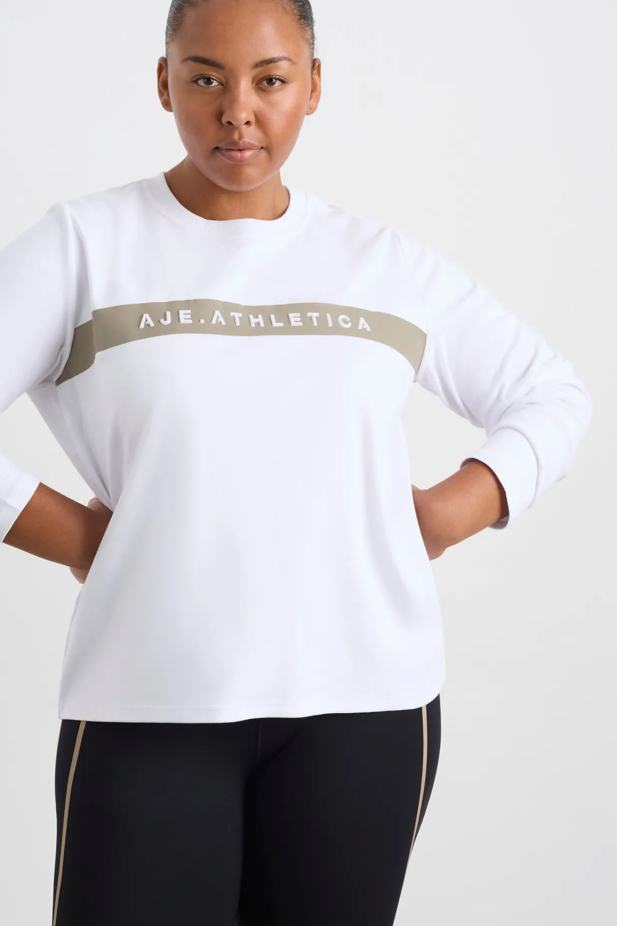 embossed_logo_long_sleeve_tshirt__14.webp Shop Aje ATHLETICA Embossed Logo Long Sleeve T-Shirt 127 White Soft Khaki