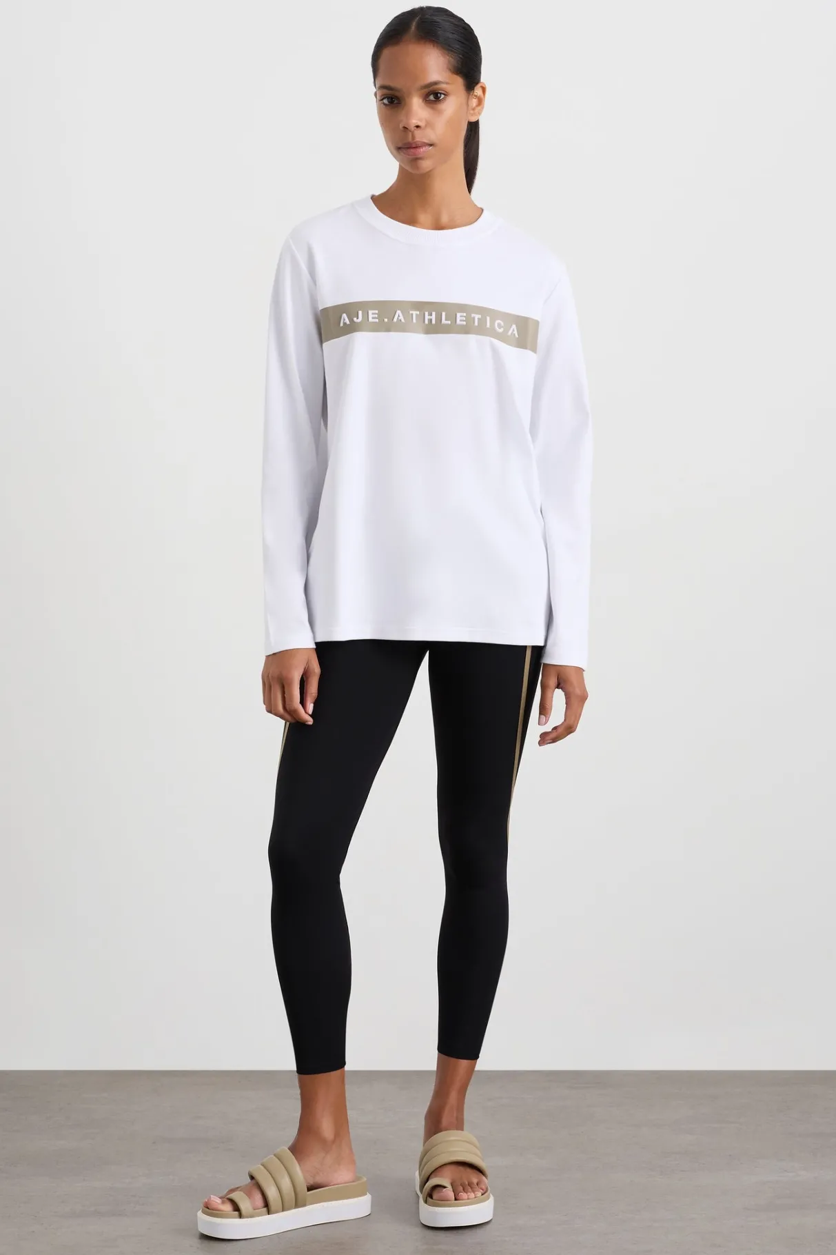 embossed_logo_long_sleeve_tshirt__2.webp Shop Aje ATHLETICA Embossed Logo Long Sleeve T-Shirt 127 White Soft Khaki