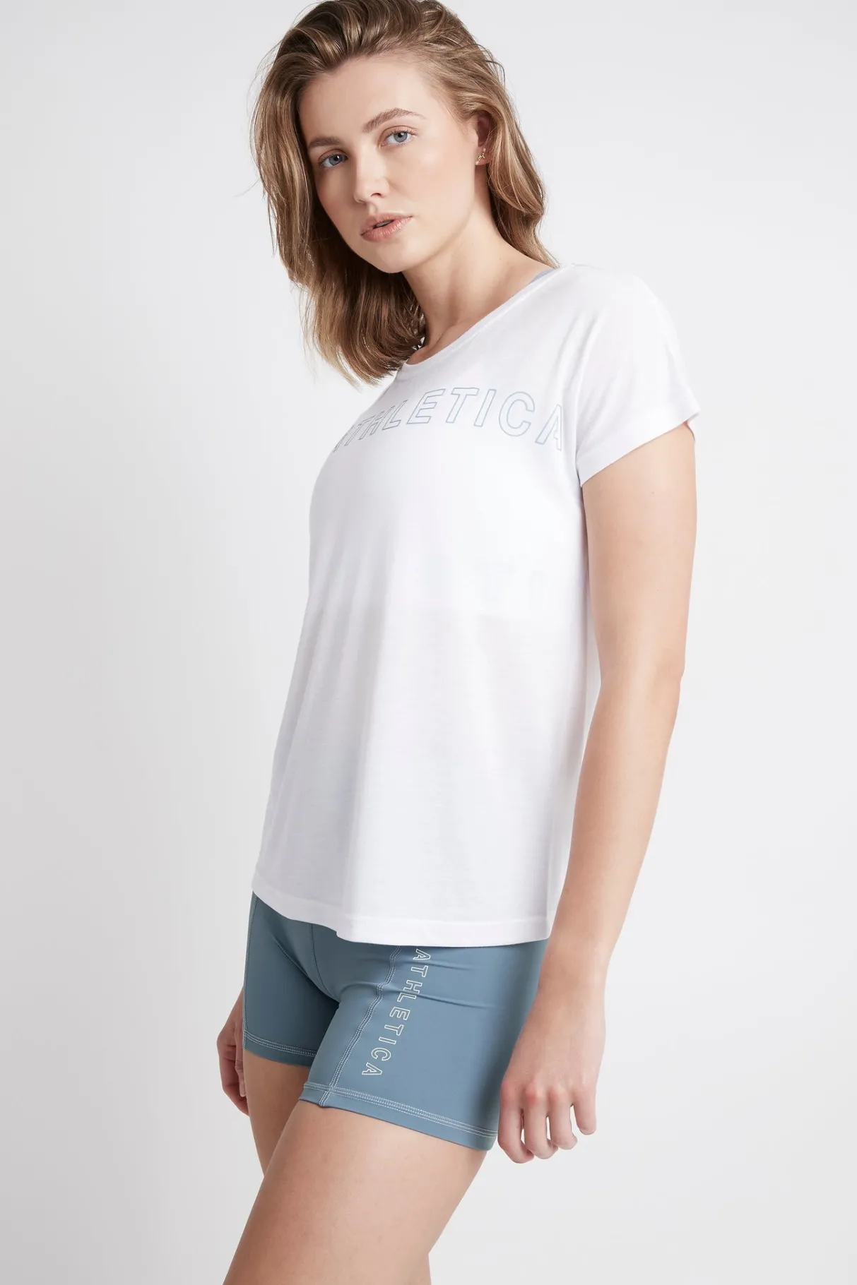 embossed_signature_logo_training_tshirt__2.webp Cheap Aje ATHLETICA Embossed Signature Logo Training T-Shirt 110 White/Storm Blue