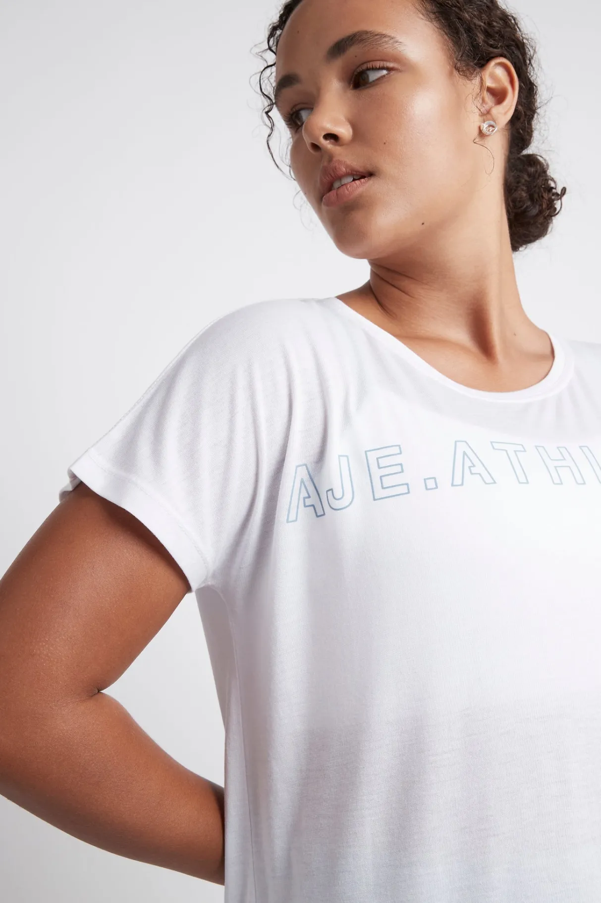 embossed_signature_logo_training_tshirt__8.webp Cheap Aje ATHLETICA Embossed Signature Logo Training T-Shirt 110 White/Storm Blue