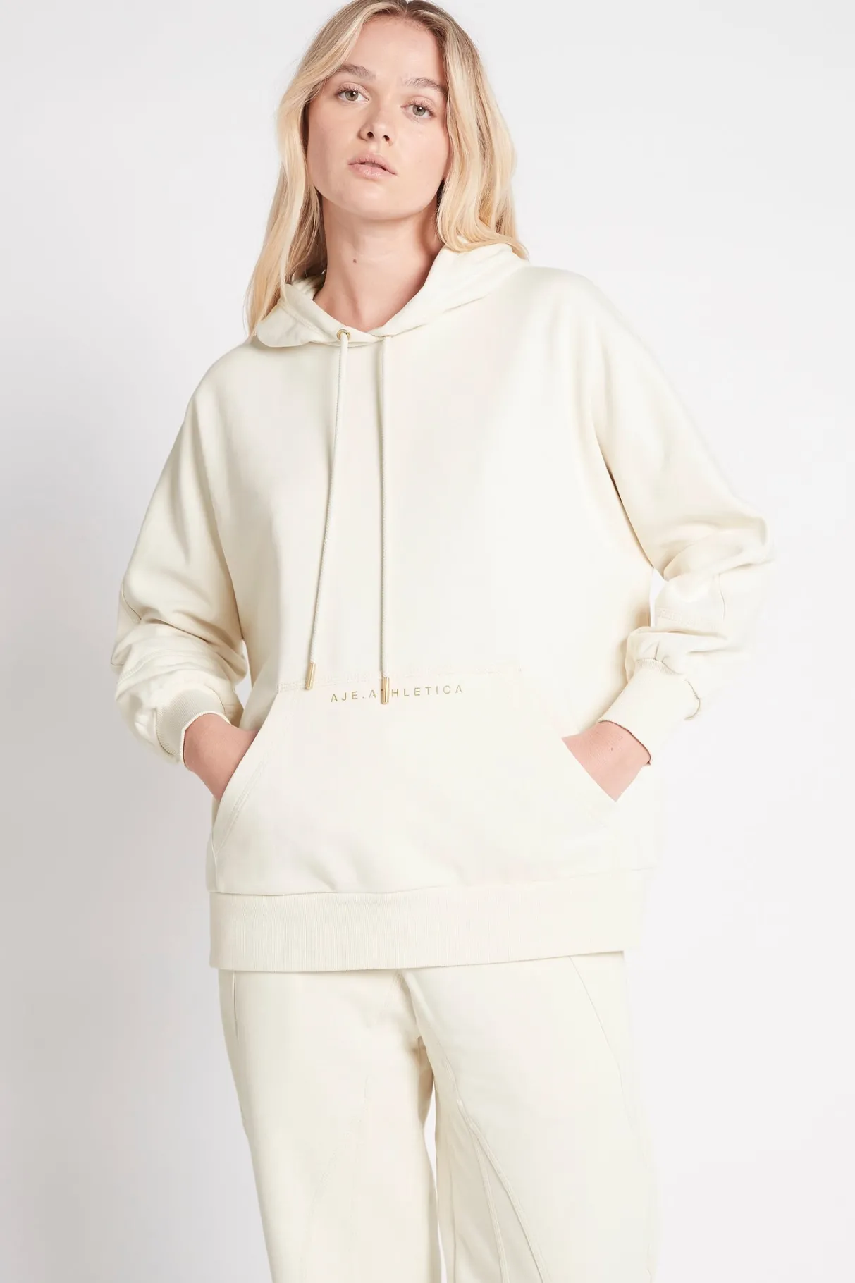 essential_hoodie__0.webp Cheap Aje ATHLETICA Essential Hoodie 411 Light Ivory/Gold