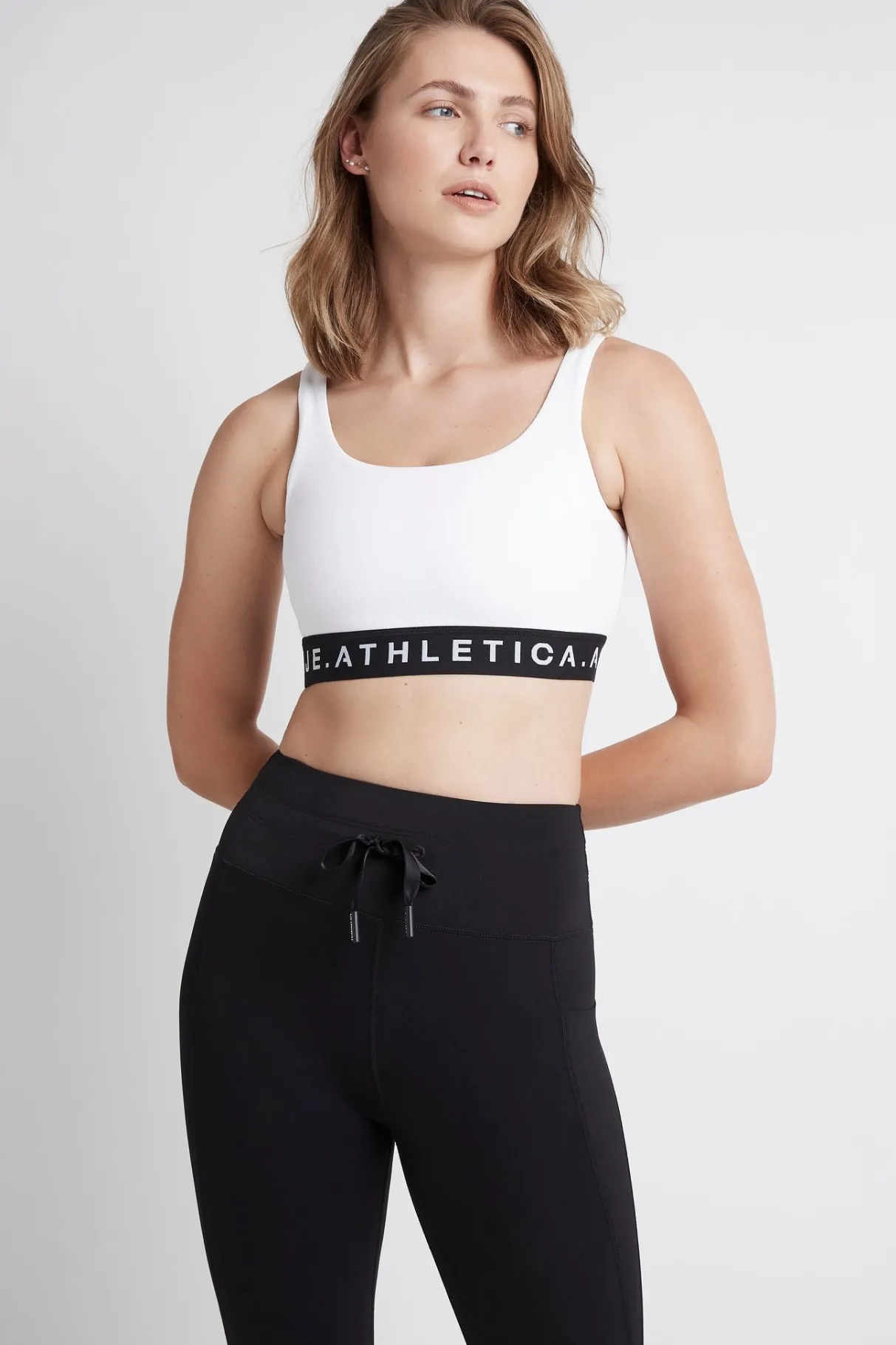 essential_logotape_sports_bra__0.webp Hot Aje ATHLETICA Essential Logotape Sports Bra 307 White/Black