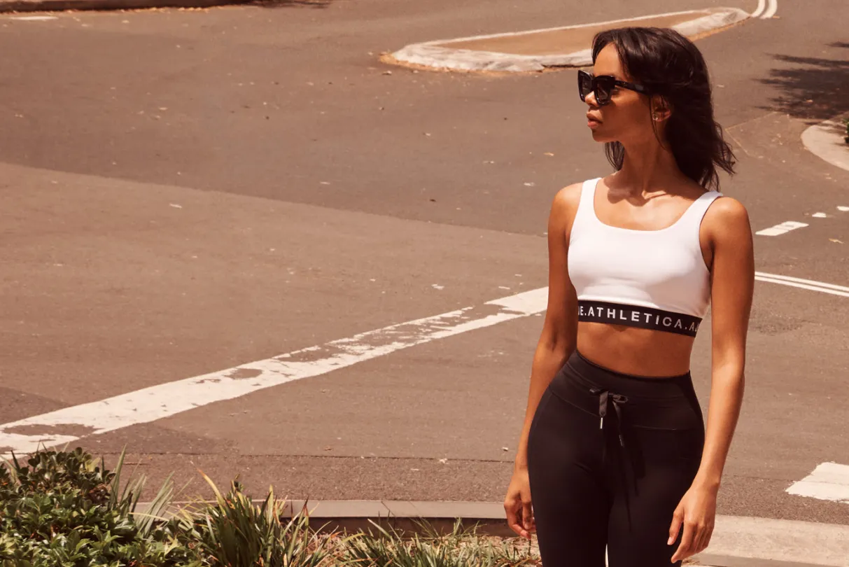 essential_logotape_sports_bra__15.webp Hot Aje ATHLETICA Essential Logotape Sports Bra 307 White/Black