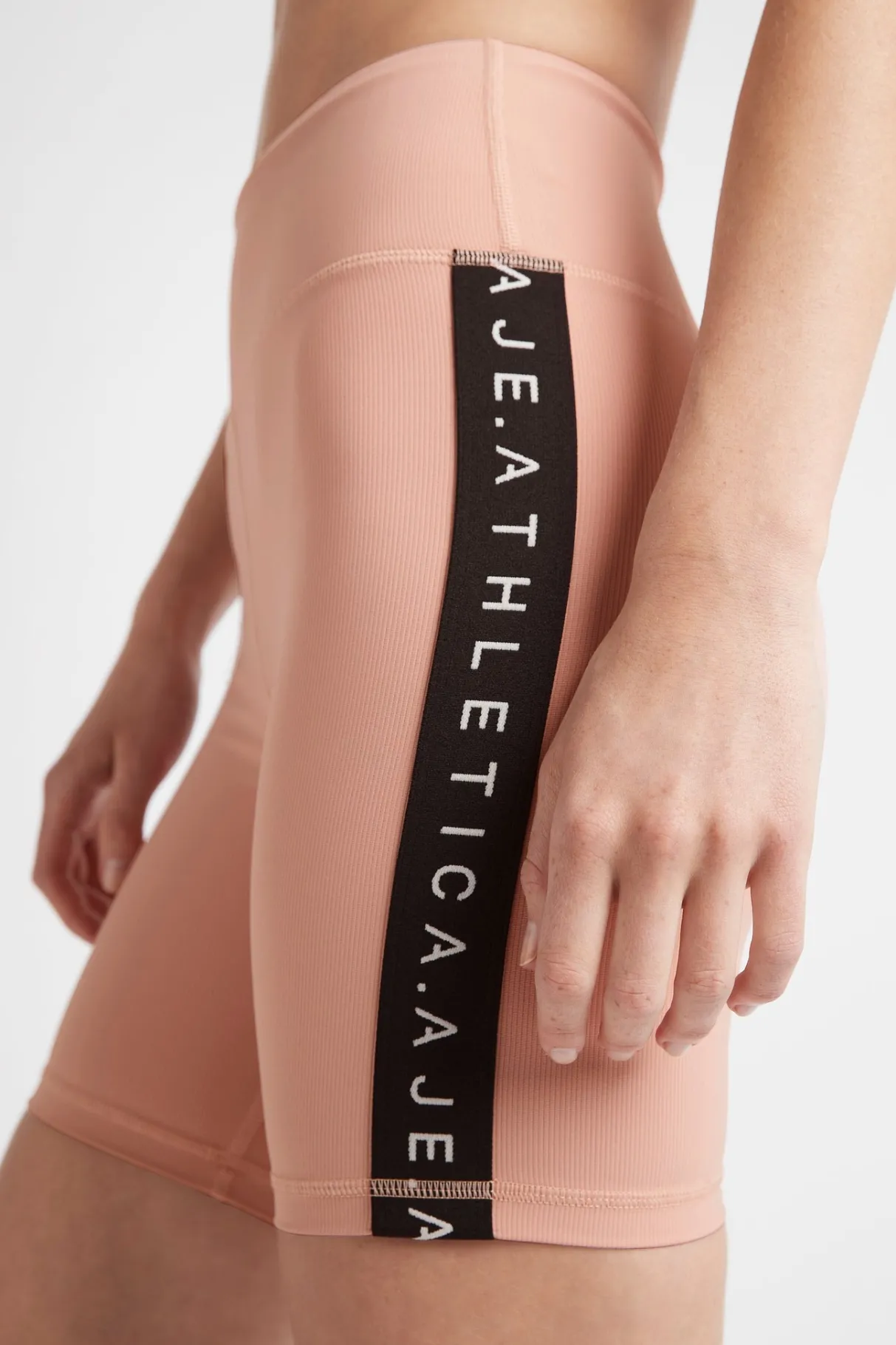 essential_mid_length_bike_shorts__3.webp Fashion Aje ATHLETICA Essential Mid Length Bike Shorts 601 Sunset Pink